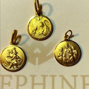 14k religious pendant. Price is for one ..gold 1.5g. St Christopher is sold ...